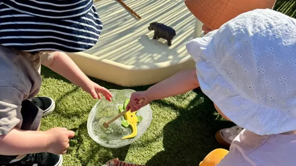 Children enjoying water and sensory play at Humberston Country Club Pre-School