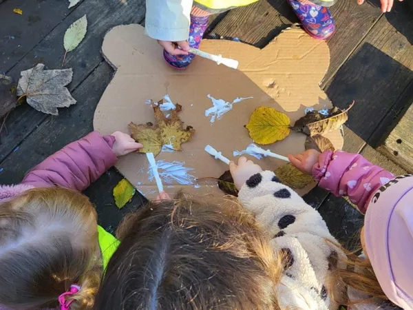 Child enjoying creative activities at Early Years Educare pre-school