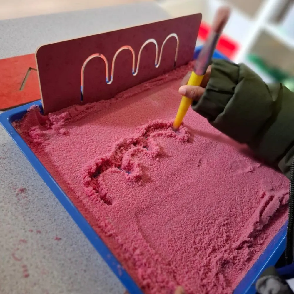 Child engaged in activities at Early Years Educare