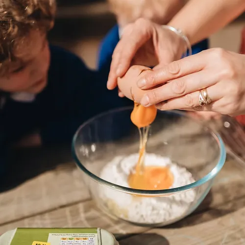 Child enjoying a healthy breakfast at Early Years Educare