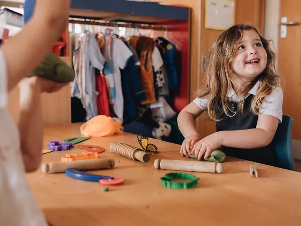 Child enjoying creative activities at Early Years Educare pre-school